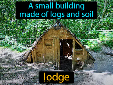 A small building made of logs and soil