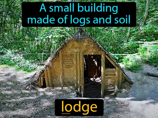 A small building made of logs and soil