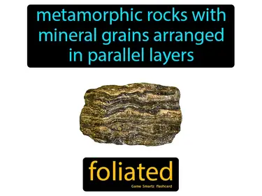 metamorphic rocks with mineral grains arranged in parallel layers