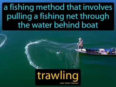 A fishing method that involves pulling a fishing net through the water behind boat